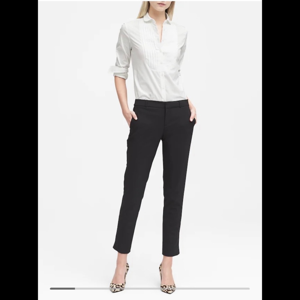 Black ankle length slacks. Petite size 2.
